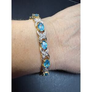Vintage blue topaz and diamond gold over sterling silver tennis bracelet